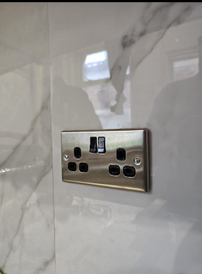 Wall-mounted TV installation with hidden cables